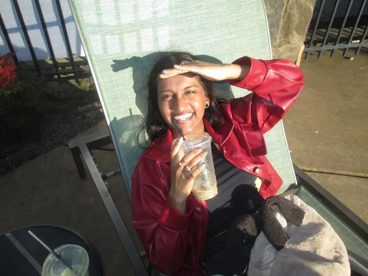 Dhaya relaxing outdoors